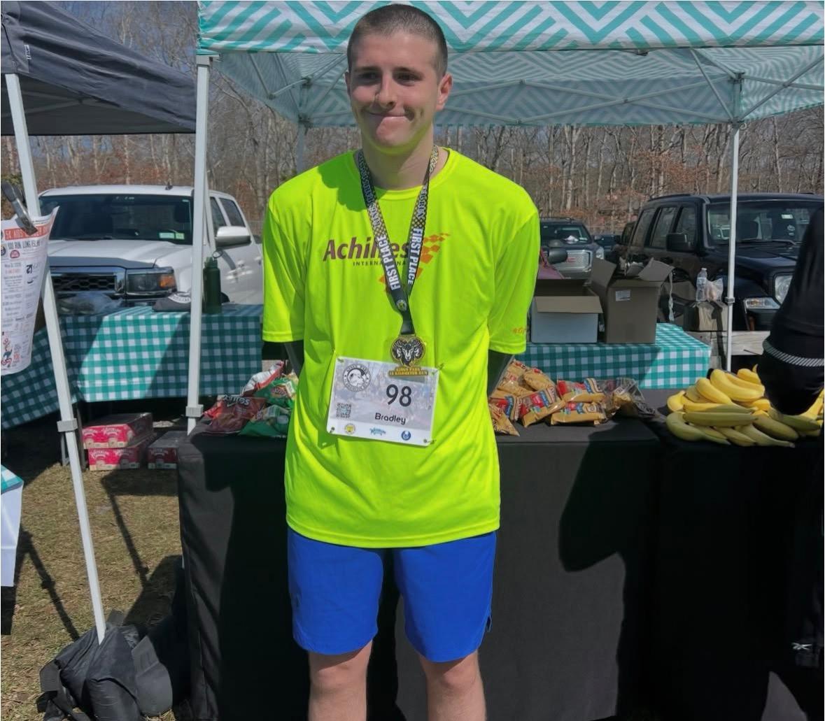 Bradley enjoying some snacks after the race