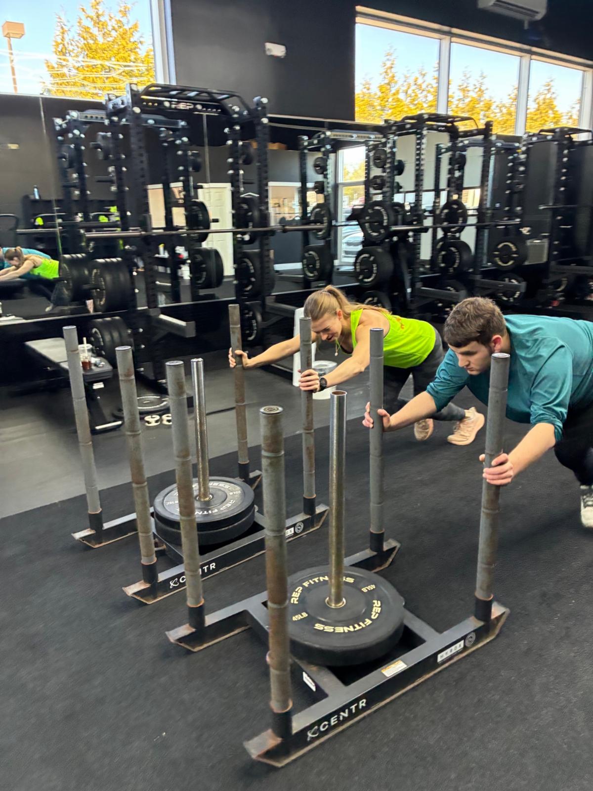 athlete and guide use sleds