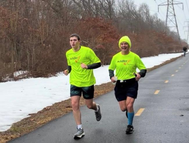 Bradley and Cormac running down the scenic Bethpage park